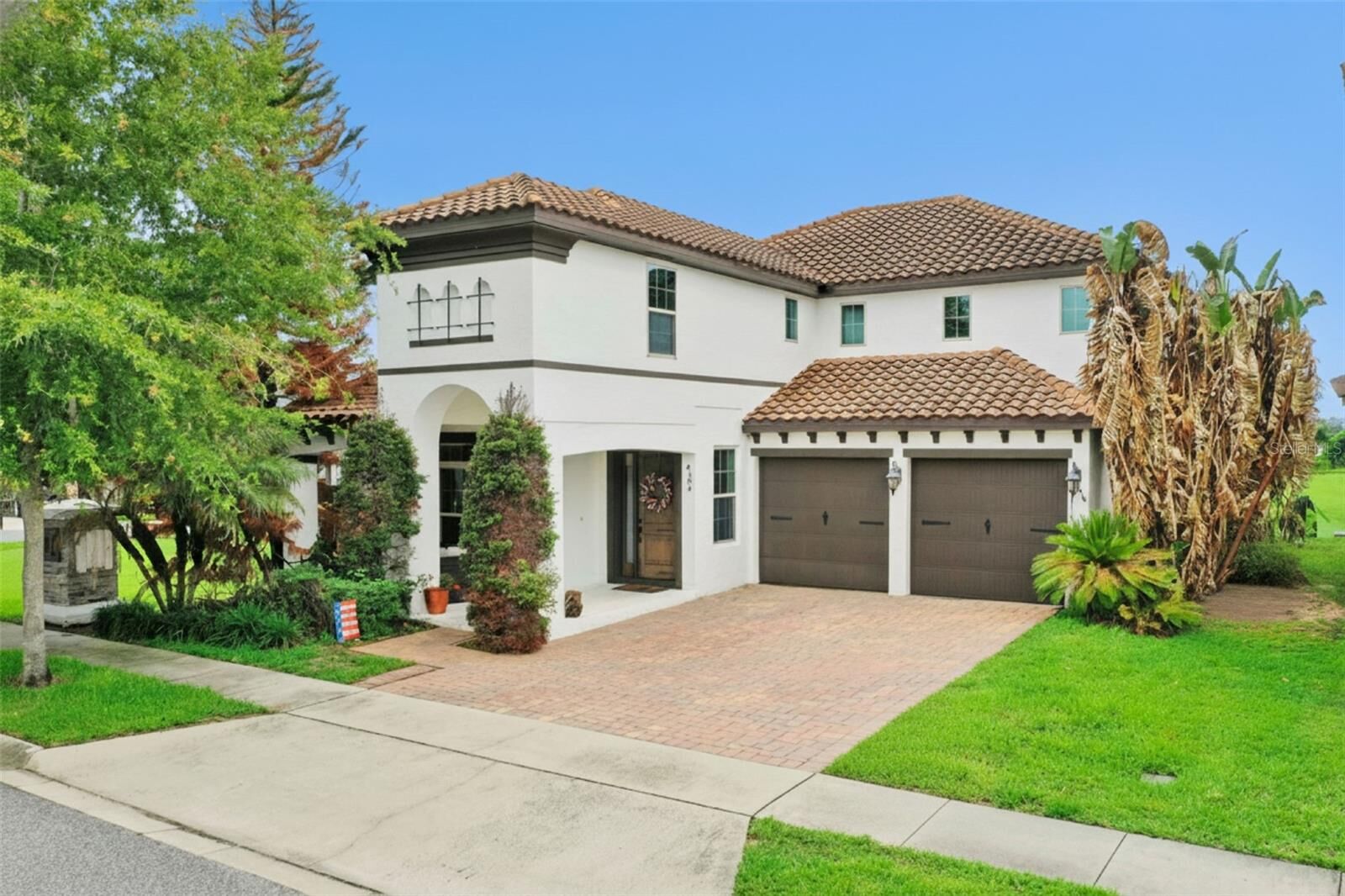 Property Photo: 9189 Busaco Park Way FL 34787