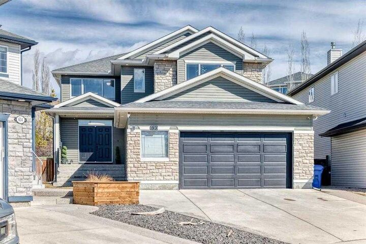 Property Photo: 630 Rocky Ridge View NW AB T3G 5C2