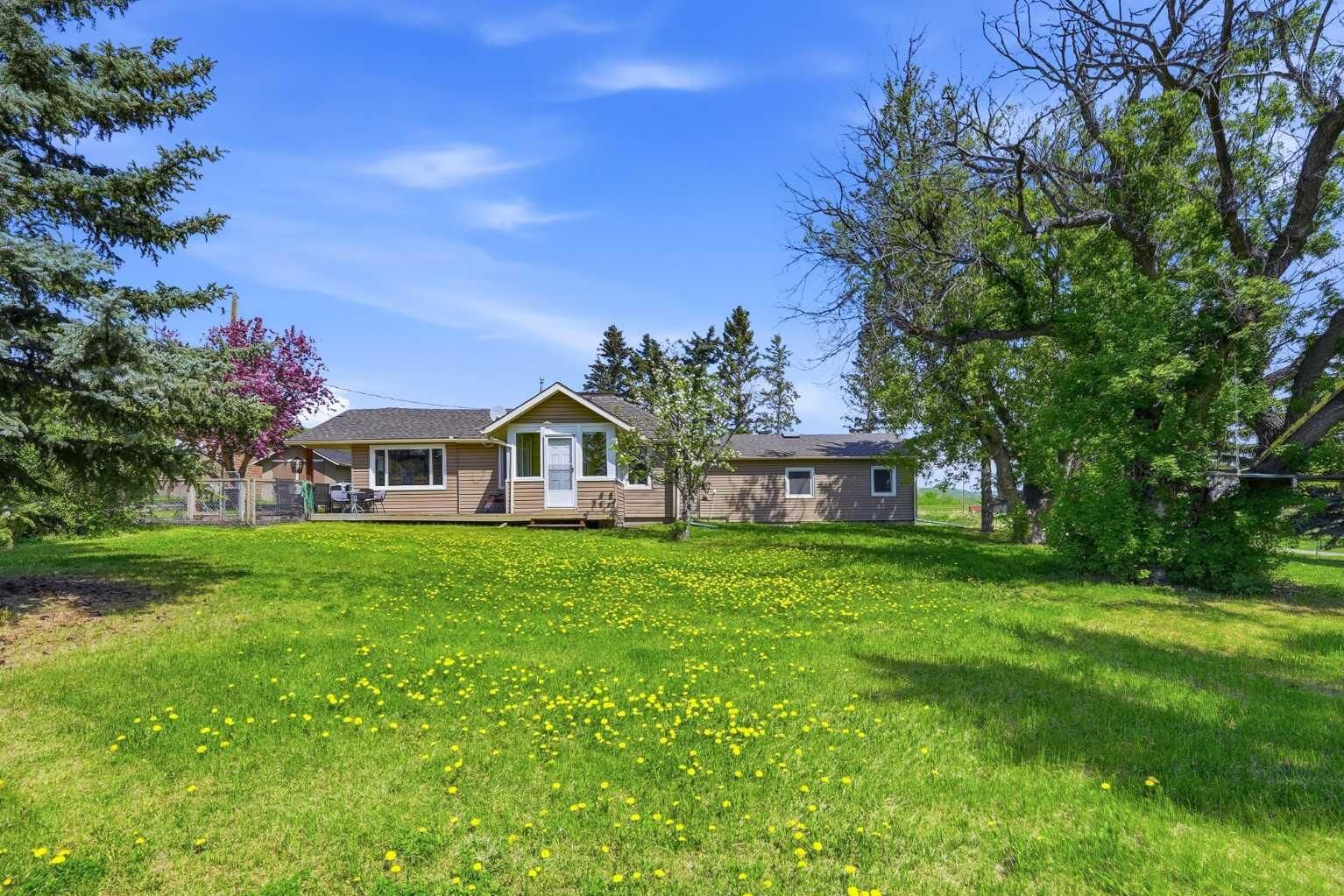 Property Photo: 322191 135 Street W AB T1S 0X7