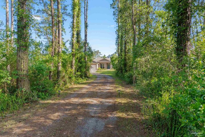 Property Photo:  9073 E River Dr  FL 32566 