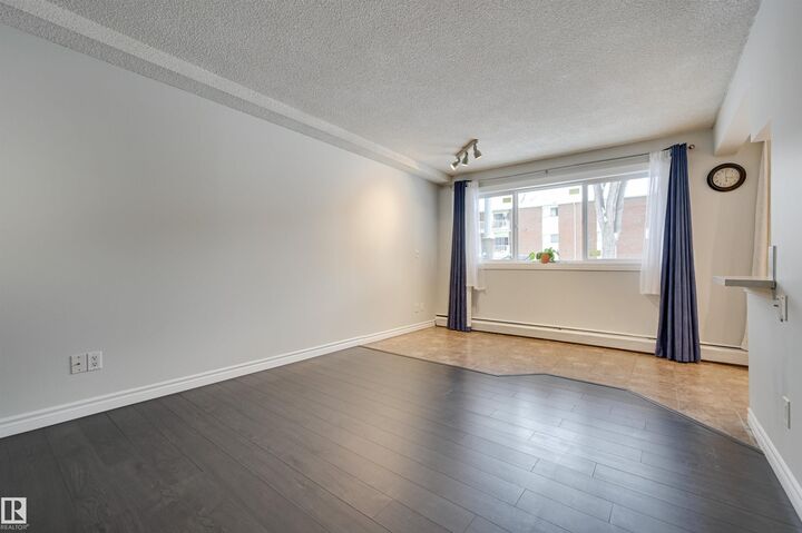Property Photo:  10621 79 Avenue NW 105  AB T6E 1S2 