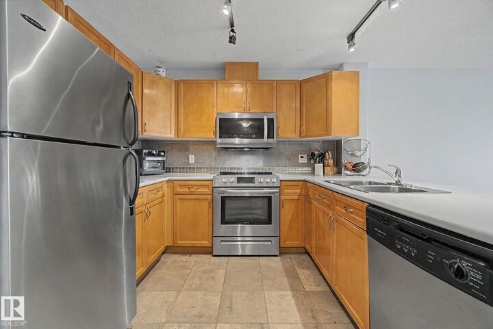Property Photo: 530 Hooke Road NW 303 AB T5A 5J5