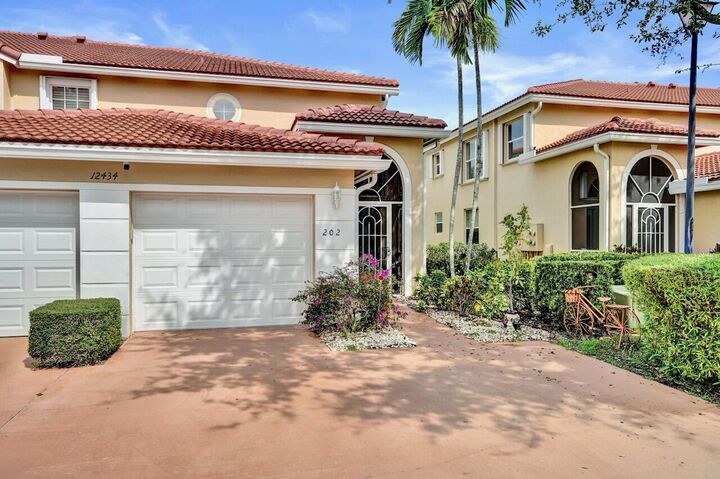 Property Photo:  12434 Crystal Pointe Drive 202  FL 33437 
