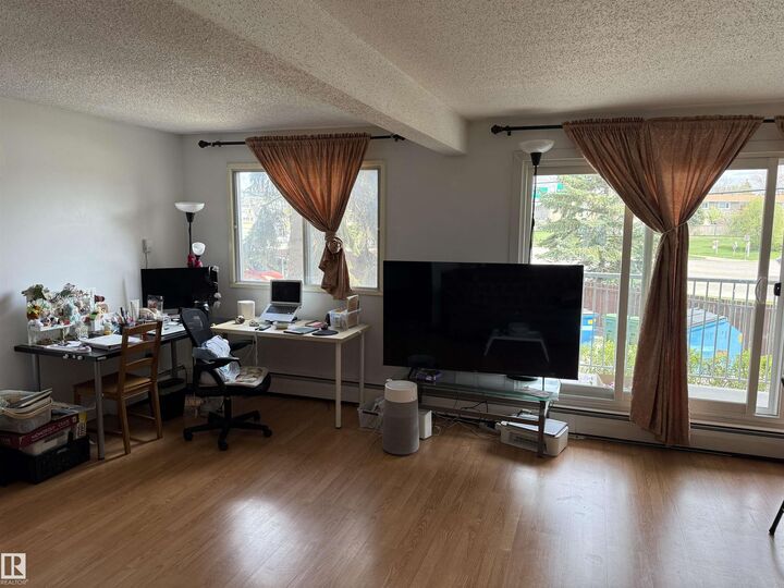 Property Photo: 4404 122 Street NW 225 AB T6J 4A9