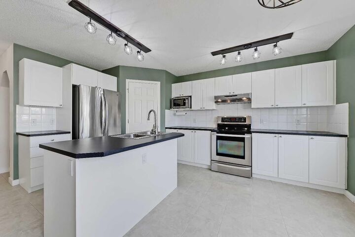 Property Photo: 123 Arbour Butte Road NW AB T3G 4L9