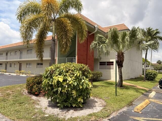 Property Photo:  607 S State Rd 7 1G  FL 33068 