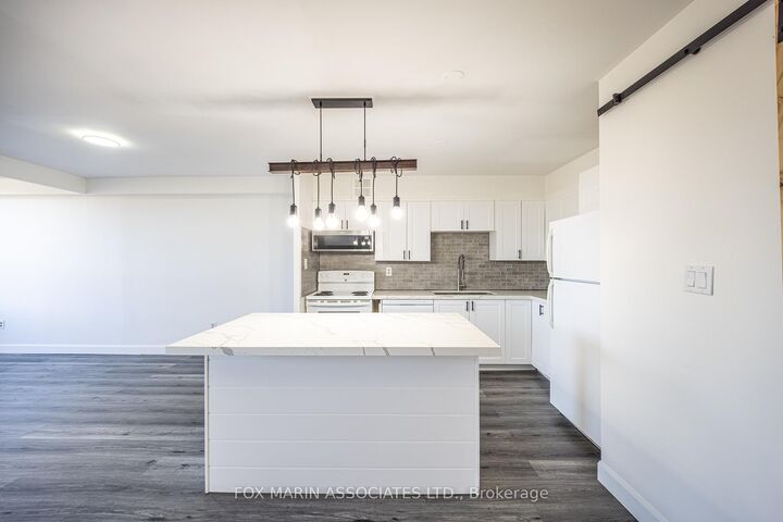 Property Photo: 20 Edgecliff Golfway 312 ON M3C 3A4