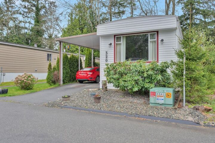 Property Photo: 1840 160 Street 320 BC V4A 4X4
