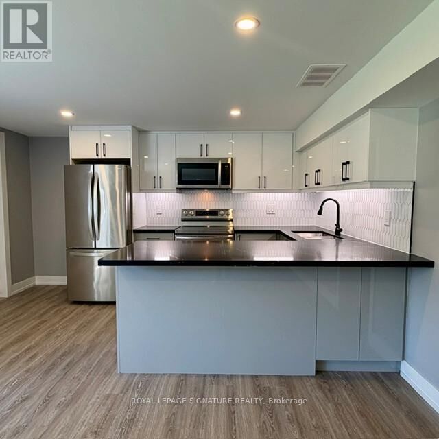 Property Photo:  61 Anewen Drive Lower  ON M4A 1R9 