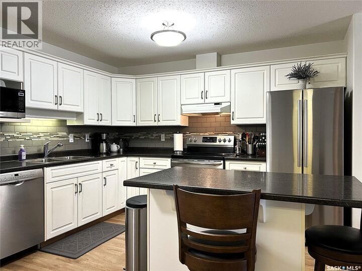 Property Photo:  105 910 Heritage View  SK S7H 5S4 