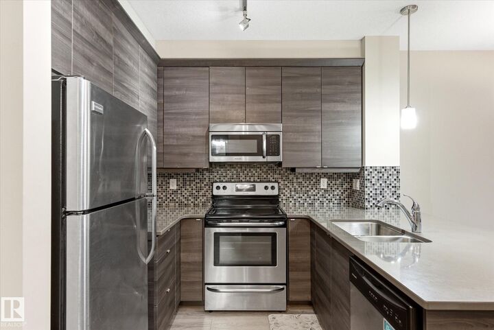 Property Photo:  2590 Anderson Way SW 218  AB T6W 0R2 