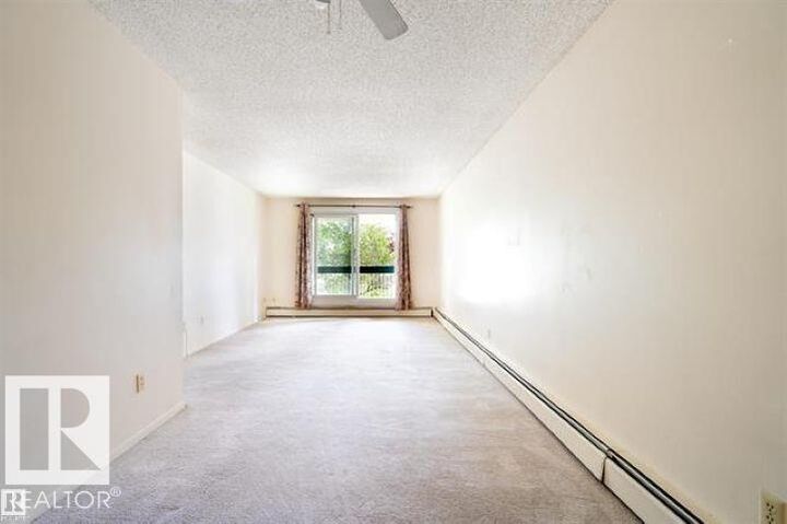 Property Photo:  1628 48 Street NW 203  AB T6L 5P5 
