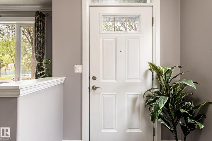 Property Photo:  12042 101 Street NW 1  AB T5G 2C1 