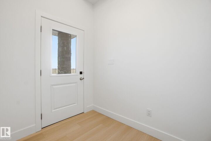 Property Photo:  1405 Osprey Crest NW  AB T5M 0M2 