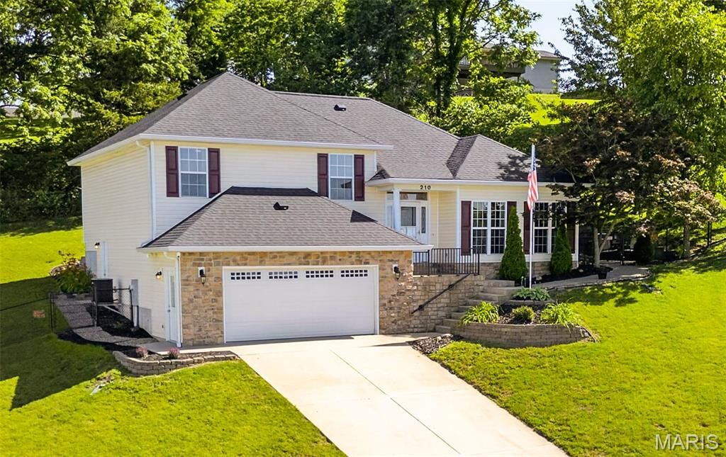 Property Photo:  210 Macarthur Street  MO 63068 