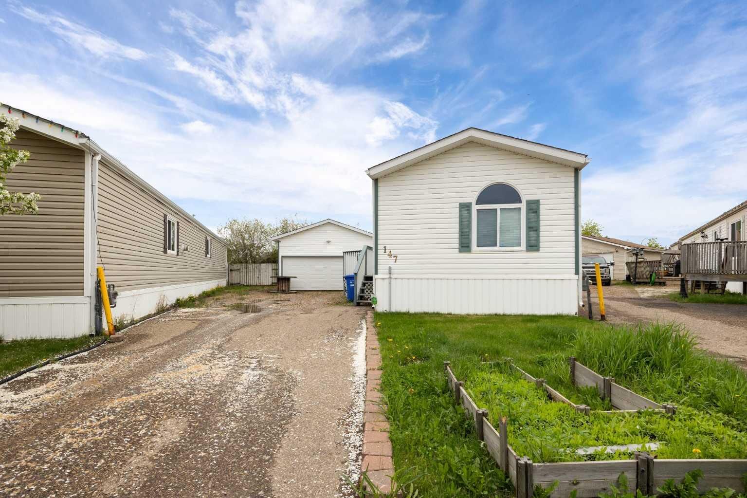Property Photo:  147 Cree Lane  AB T9K 1Y5 
