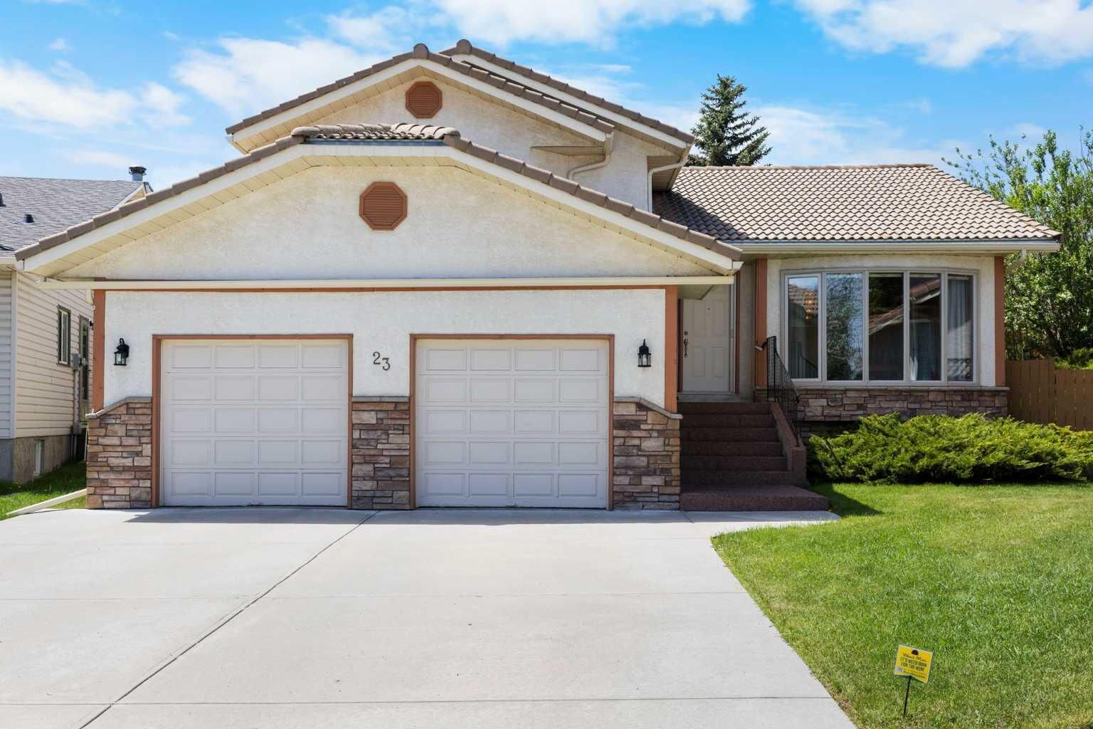 Property Photo:  23 Millside Place SW  AB T2Y 2R5 