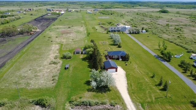 Property Photo:  70127 Kirkness Road  MB R1A 2A8 