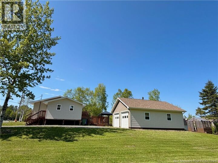 Property Photo: 393 Rue Des érables NB E8K 3M1