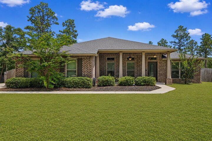 Property Photo:  6458 Welannee Boulevard  FL 32567 