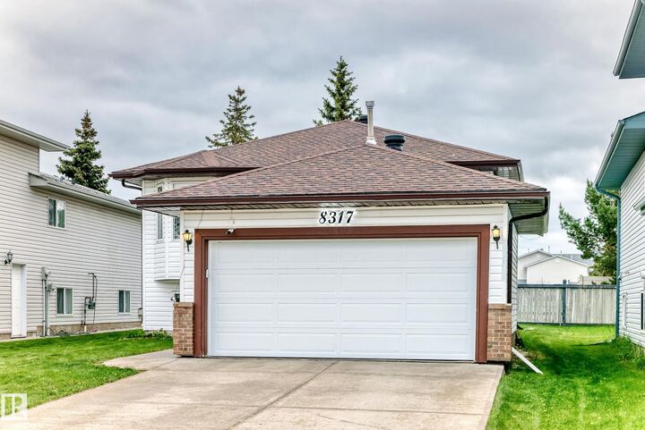 Property Photo:  8317 160A Avenue NW  AB T5Z 3G4 