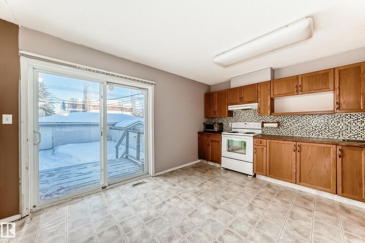 Property Photo:  11609 125 Street NW  AB T5M 0N5 