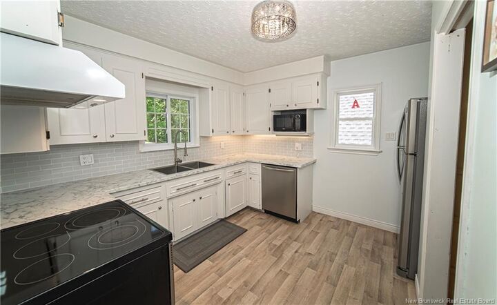 Property Photo: 16 Stonehurst Avenue NB E3C 1H1