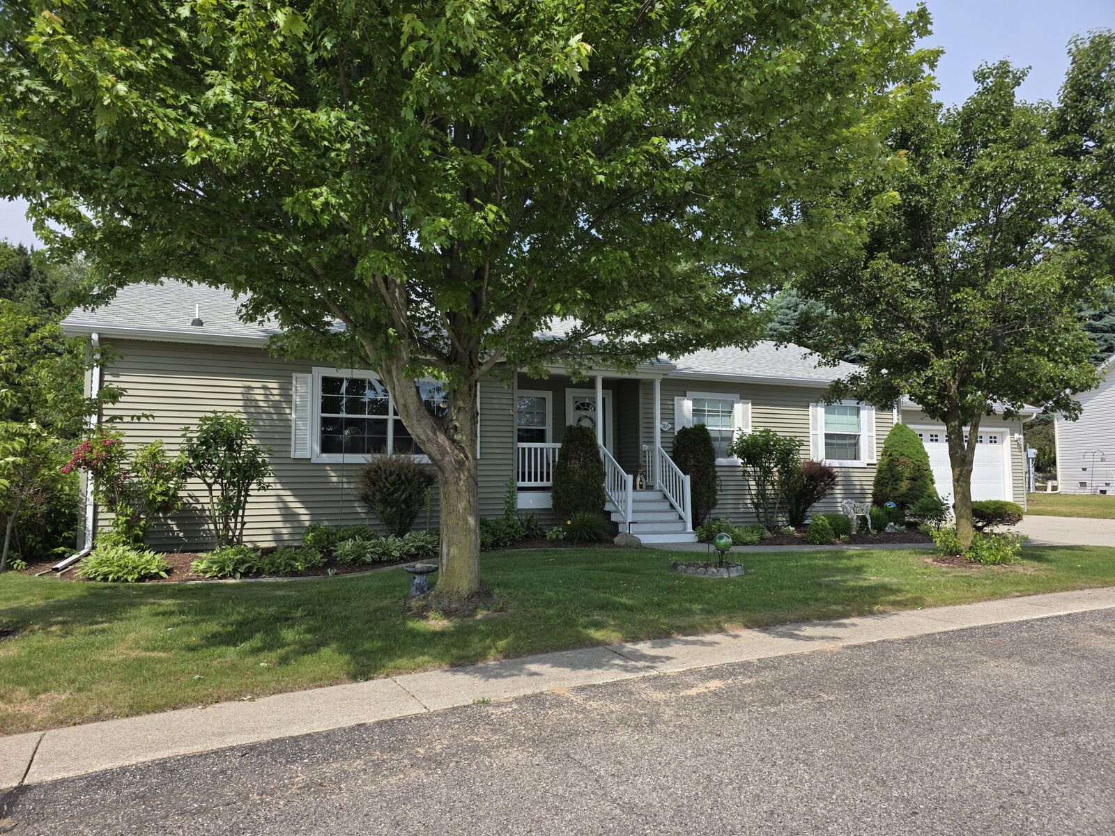 Property Photo:  705 Peach Lane  MI 49412 