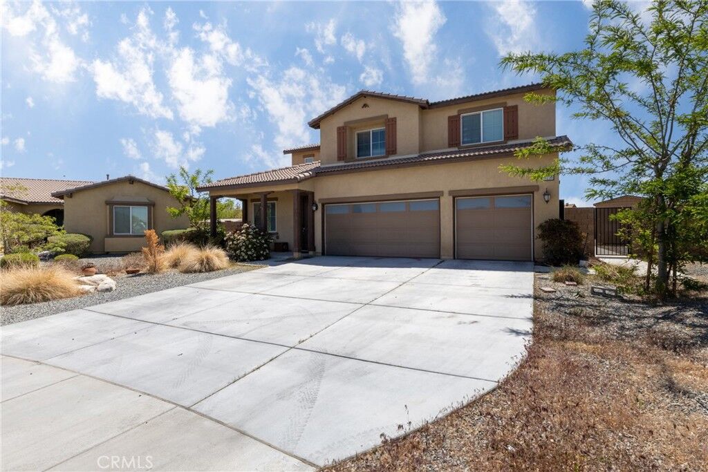 Property Photo:  11239 Scarlet Ave  CA 92301 