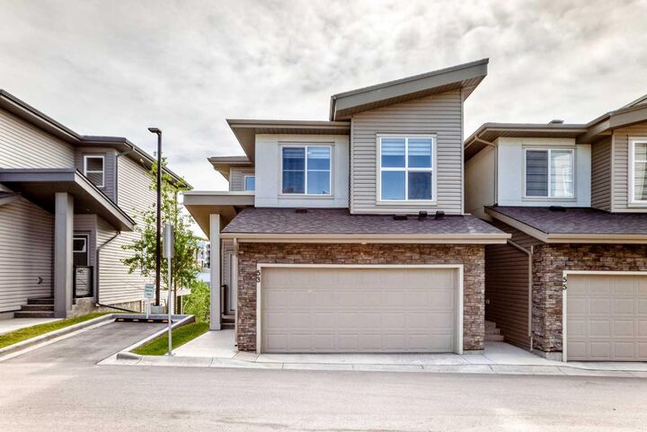 Property Photo:  53 Spring Creek Common SW  AB T3H 6E2 