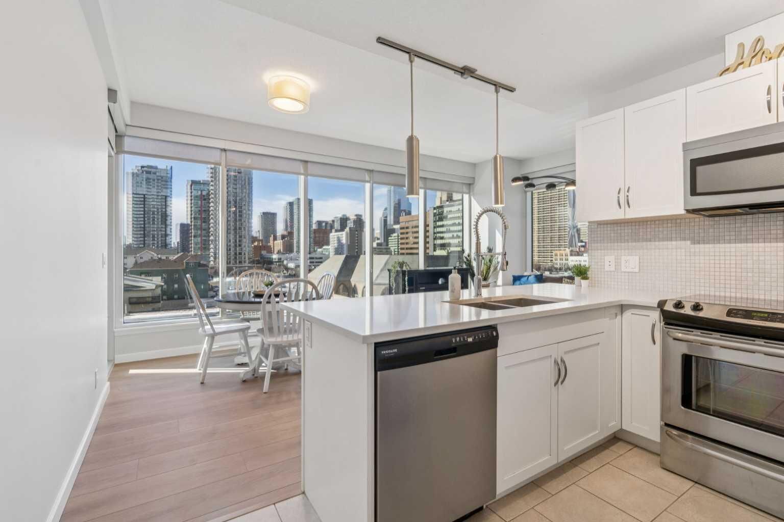 Property Photo:  1320 1 Street SE 407  AB T2G 0G8 