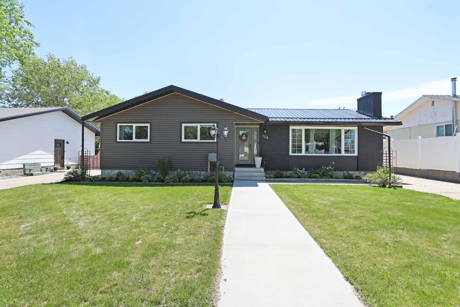 Property Photo: 120 Ingram Park Drive E AB T1R 0J9