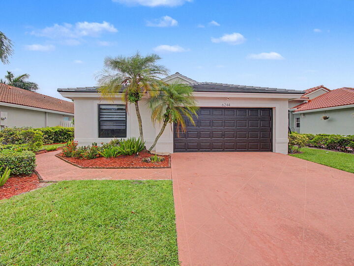 Property Photo: 6244 Grand Cypress Circle FL 33463
