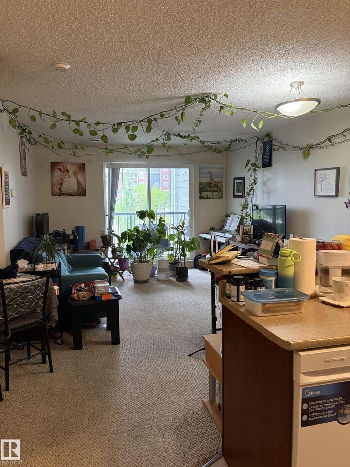 Property Photo: 6921 199 Street NW 317 AB T5T 3X7