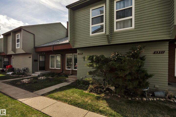 Property Photo: 5353 Hill View Crescent NW AB T6L 1V9