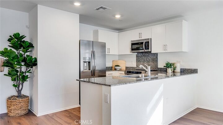 Property Photo:  7596 Vassar Avenue  CA 92345 