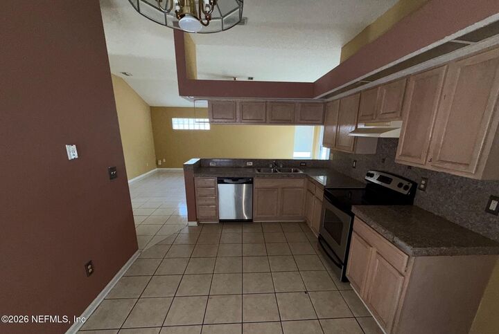 Property Photo:  1223 Homard Boulevard E  FL 32225 