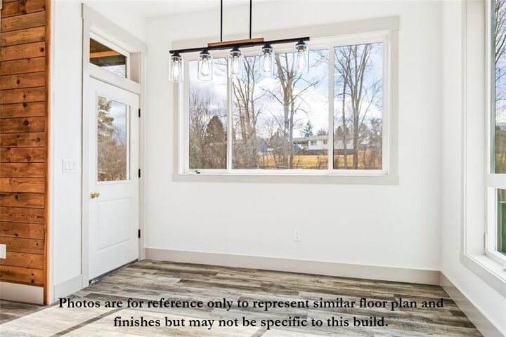 Property Photo:  5699 Golf Drive  MT 59847 