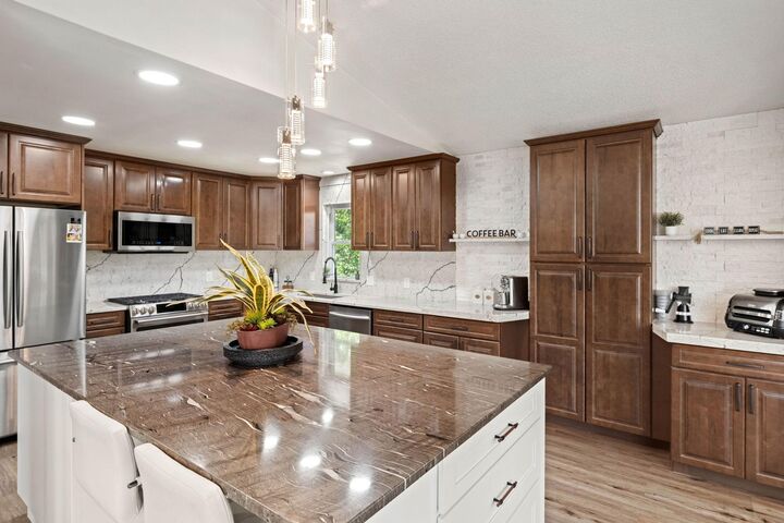 Property Photo:  7712 N College Park Drive  MN 55445 