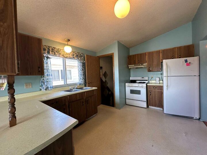 Property Photo:  5406 54 Street  AB T4L 1L9 