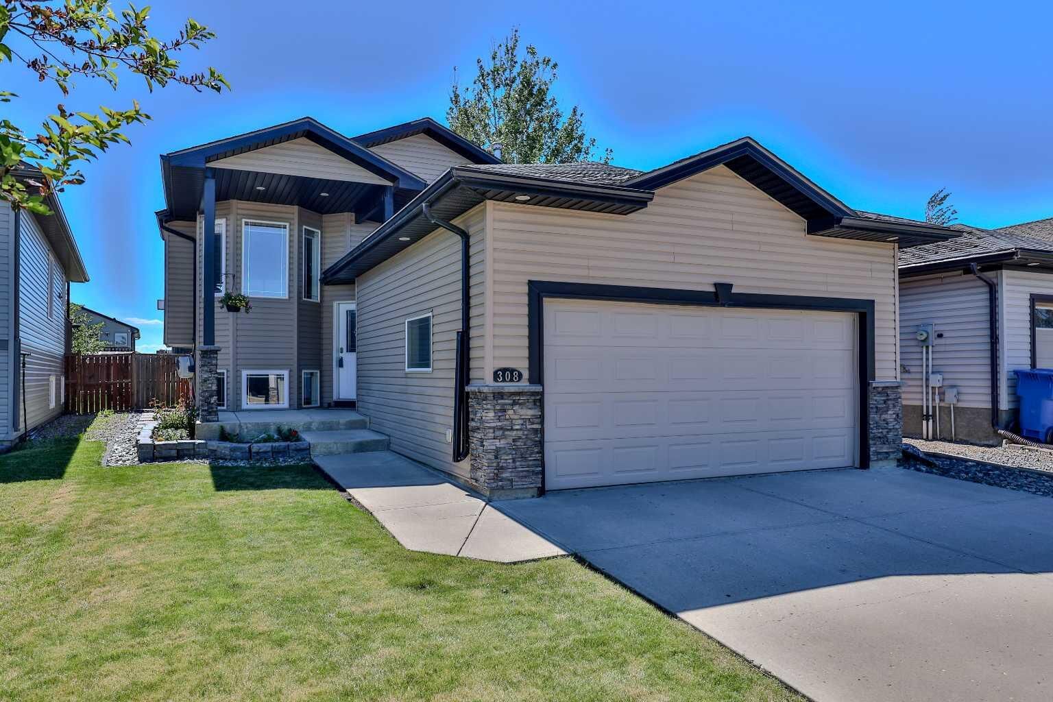 Property Photo: 308 Tartan Circle W AB T1J 0Z1
