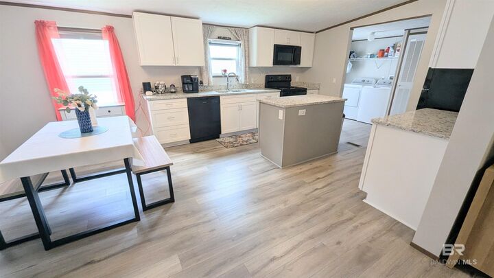 Property Photo: 1393 Ridgewood Drive AL 36549