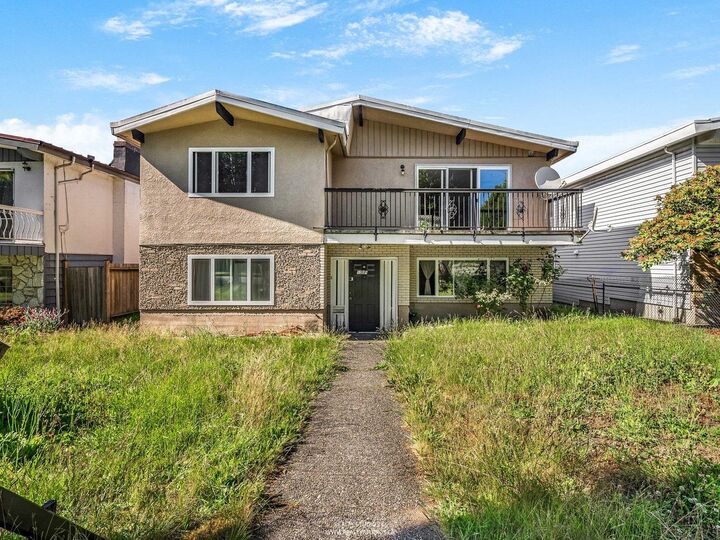 1205 E 49th Avenue — photo 1