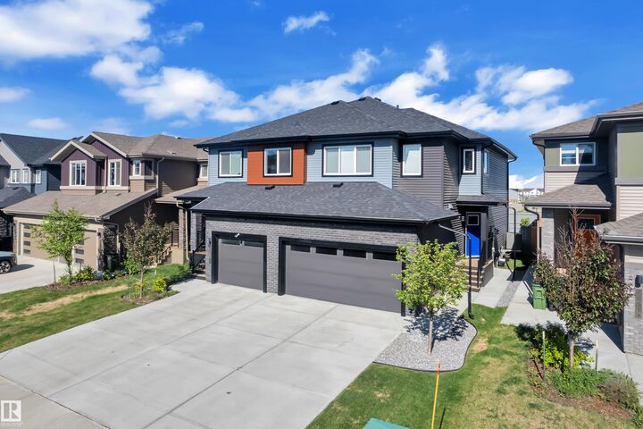 Property Photo: 7647 Koruluk Place SW AB T6W 4R7