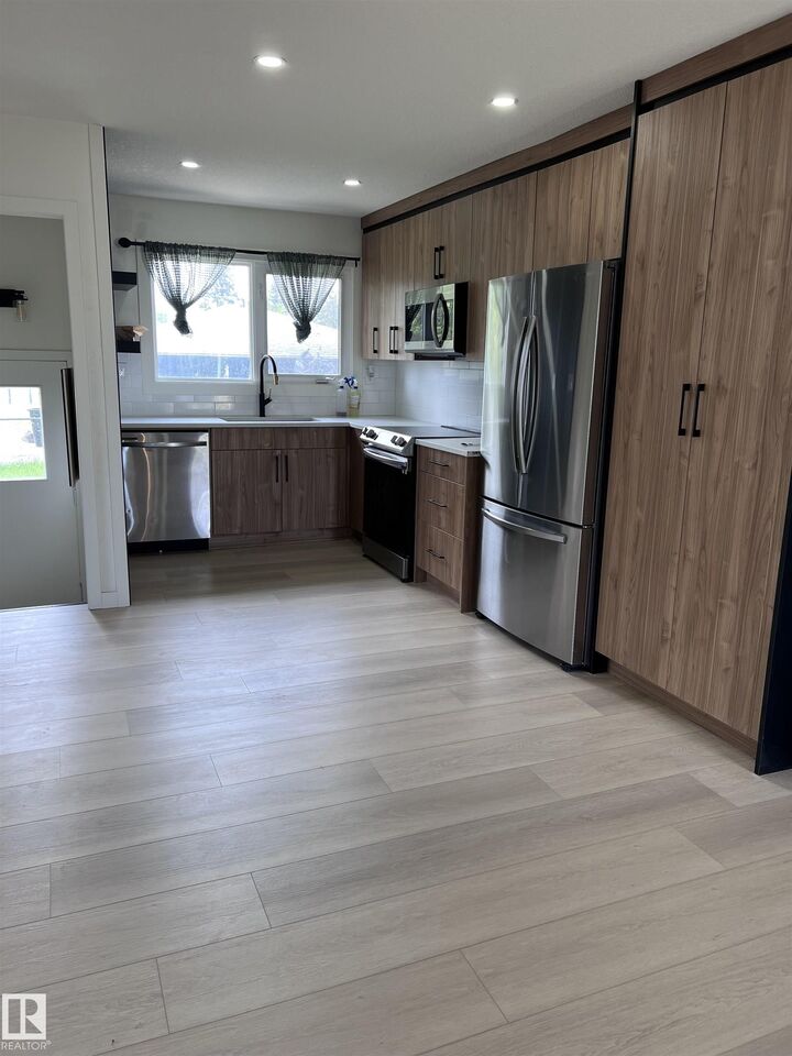 Property Photo: 11911 133 Avenue NW AB T5E 1E8