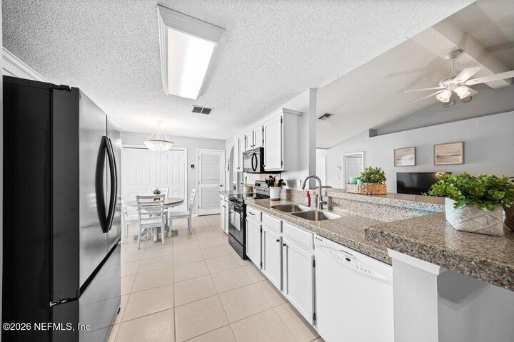 Property Photo: 11579 Greenland Hideaway Drive E FL 32258