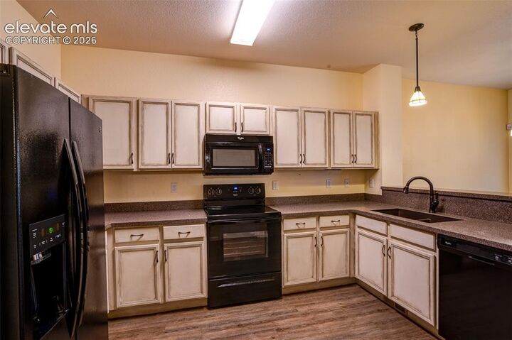 Property Photo:  6065 Ensemble Heights  CO 80923 