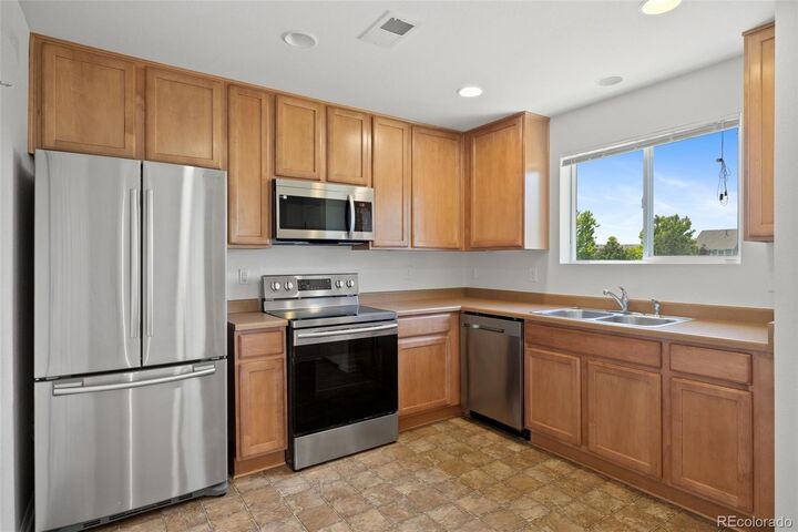 Property Photo:  19171 E 58th Avenue D  CO 80249 