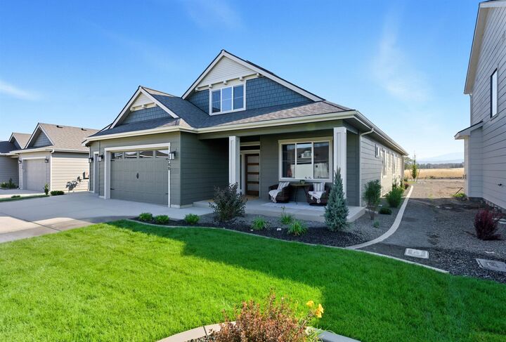 Property Photo:  12213 N Valencia Ave  WA 99218 