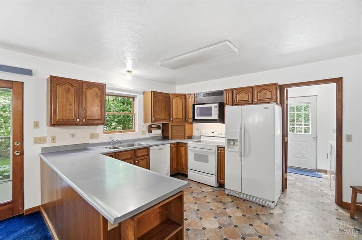 Property Photo:  9387 Harrison Pike  OH 45002 